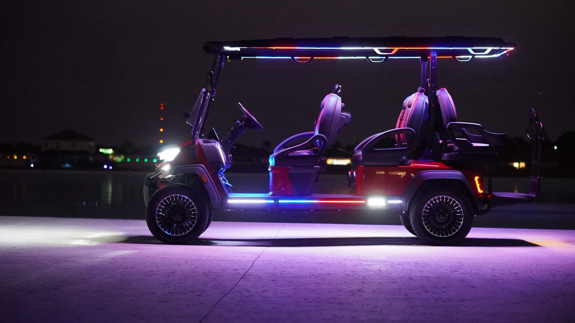 a golf cart with lights on