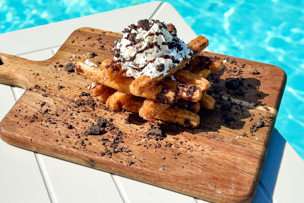 a plate of food on a wood surface