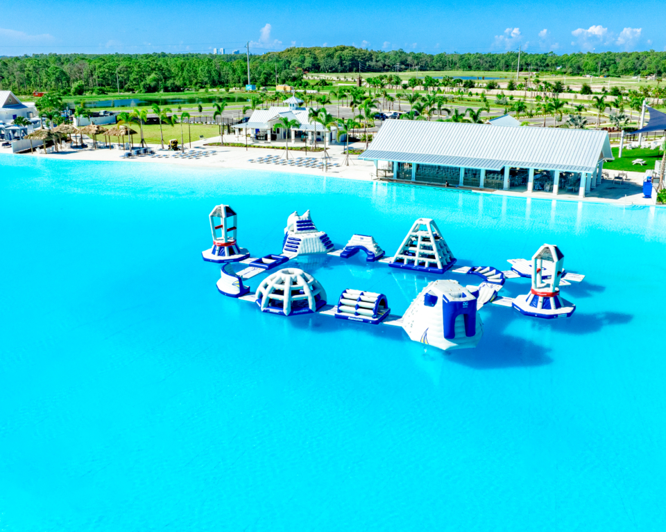 a water park with a group of floating rafts in the water