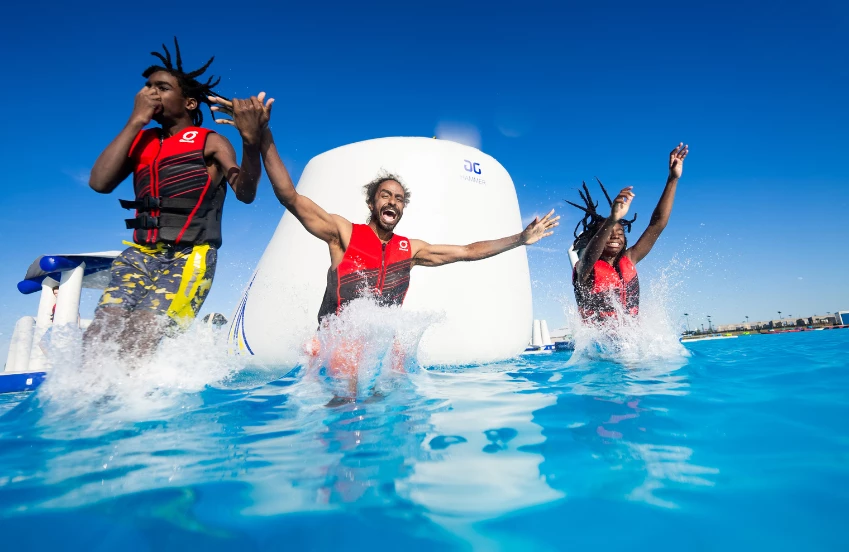 a group of people in a pool