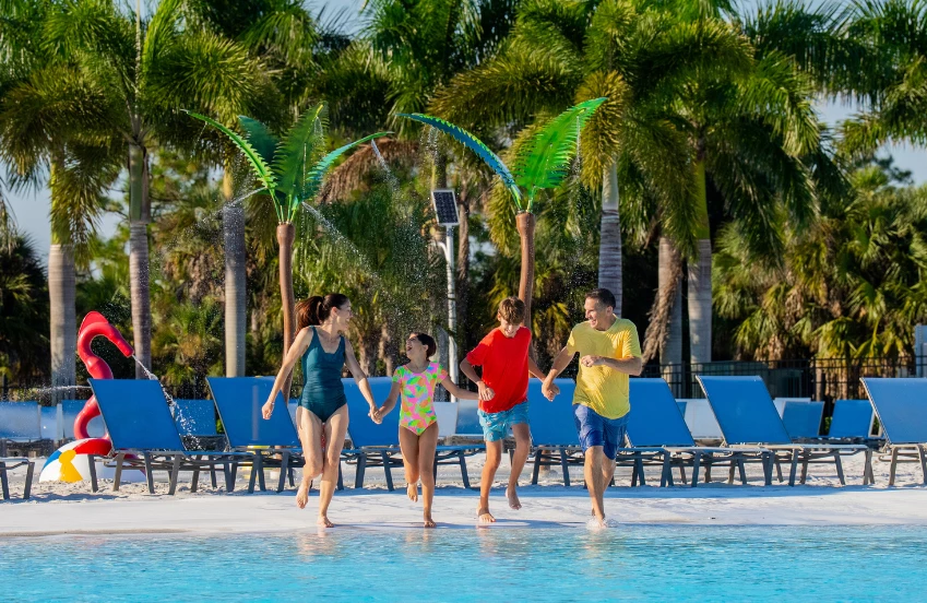 a group of people running in a pool