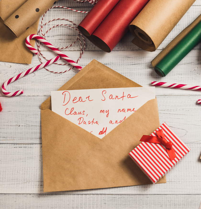 a letter to santa claus in an envelope