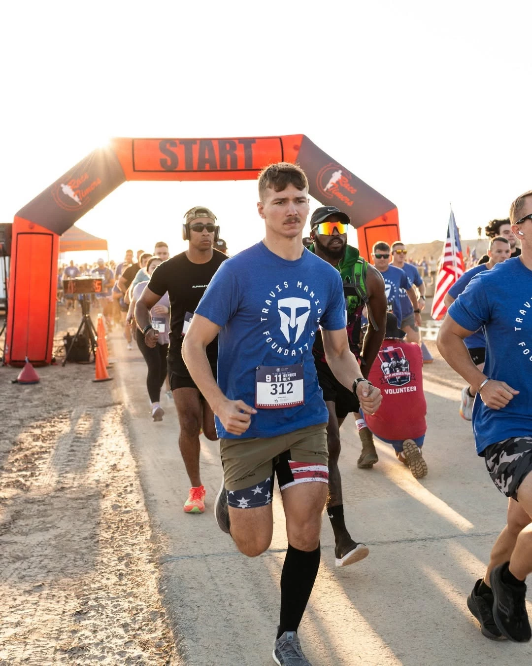 a group of people running in a race