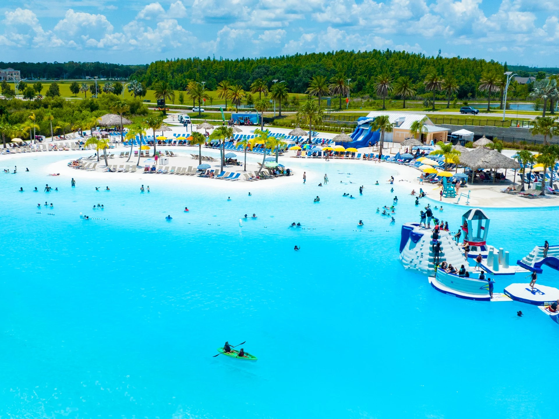 a water park with people swimming in the water