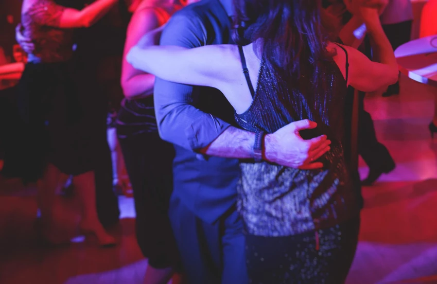 a man and woman dancing