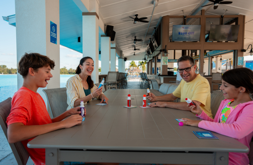 a group of people sitting at a table