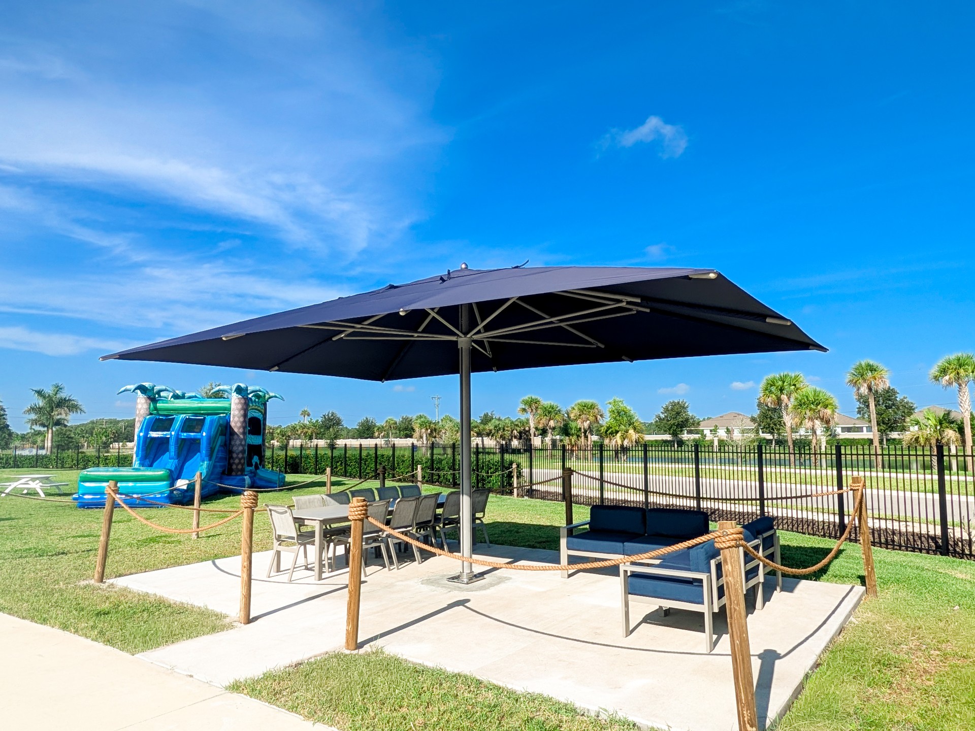 a picnic area with a large umbrella