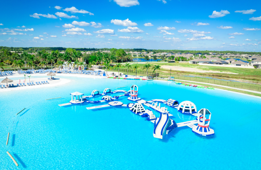 a water park with a water slide and a pool