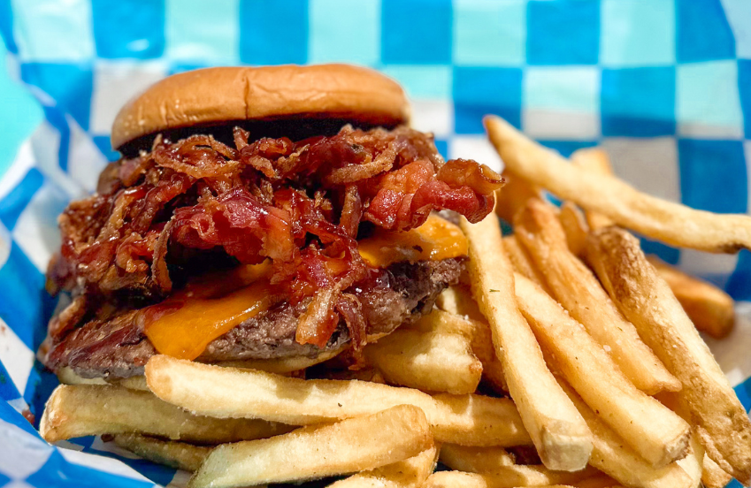 a burger and fries on a plate