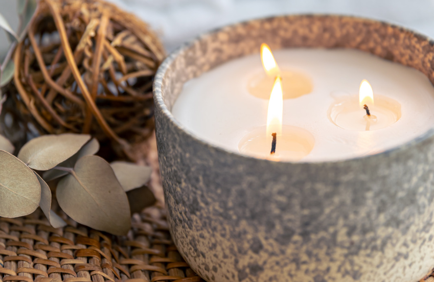 a candle in a bowl