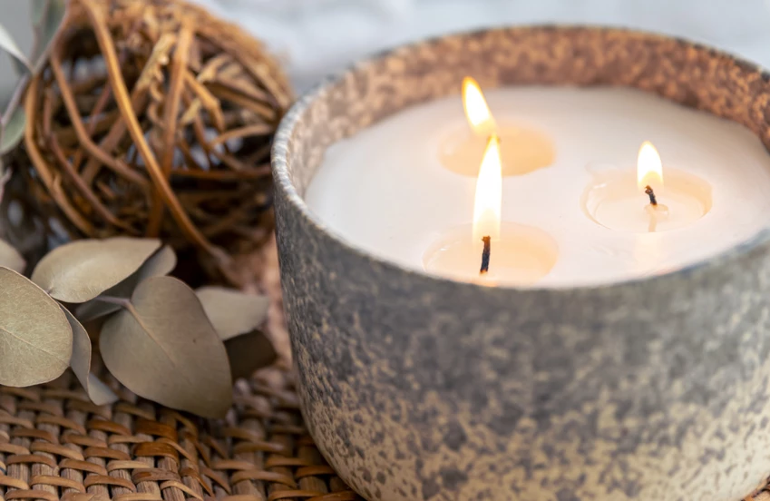 a candle in a bowl