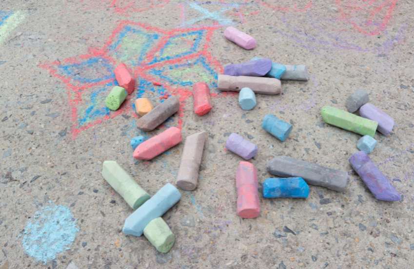 a group of chalks on the ground