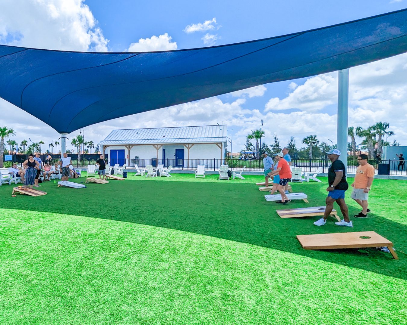 a group of people on a green field