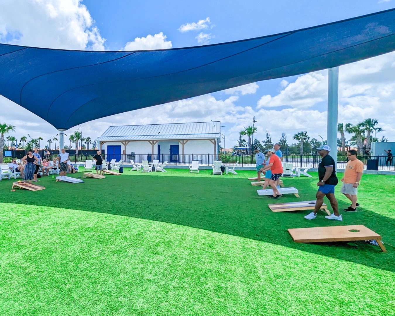 a group of people on a green field