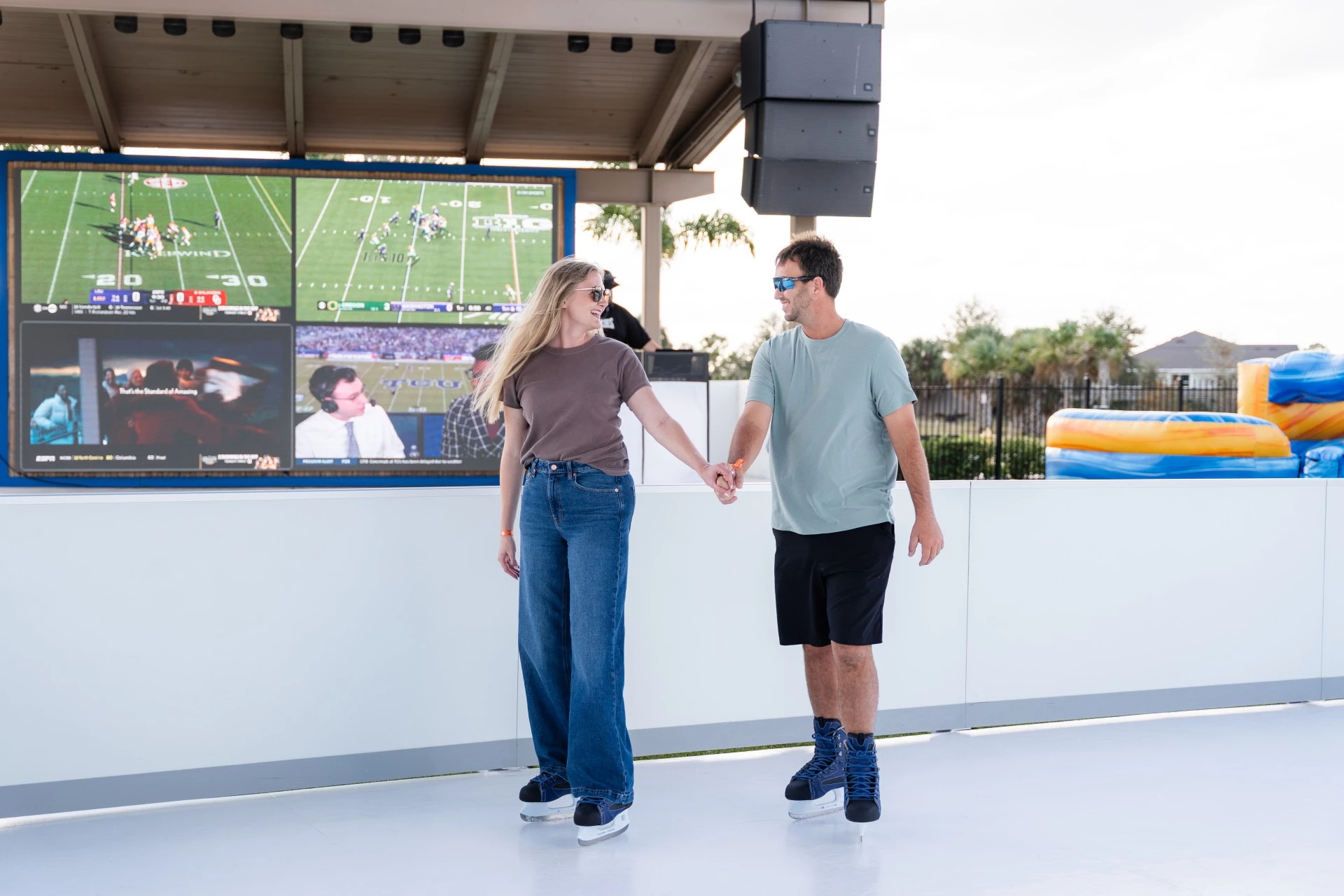 a man and woman holding hands