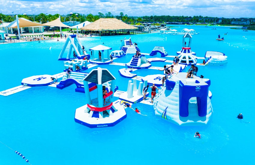 a group of people in a water park