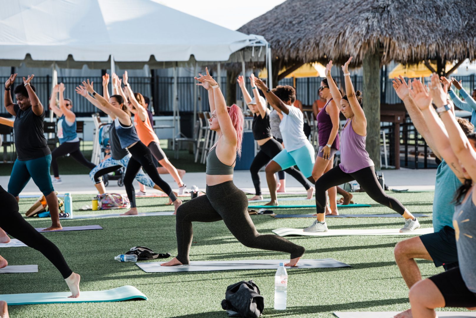 a group of people doing yoga