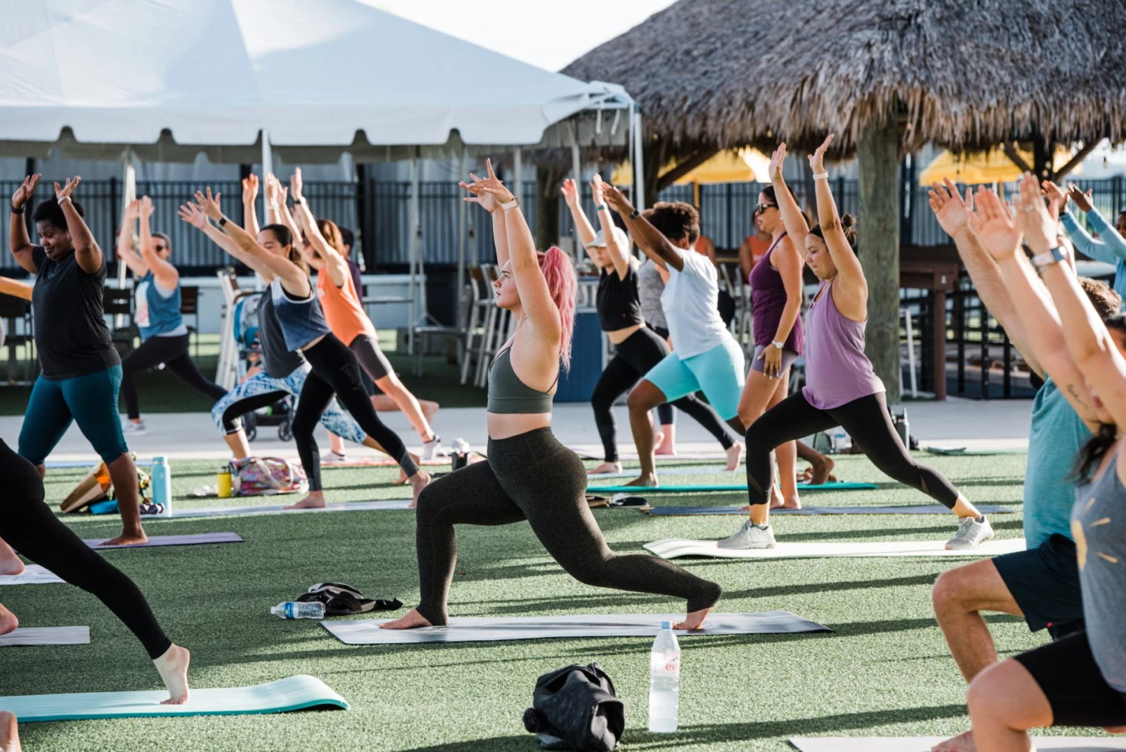 a group of people doing yoga