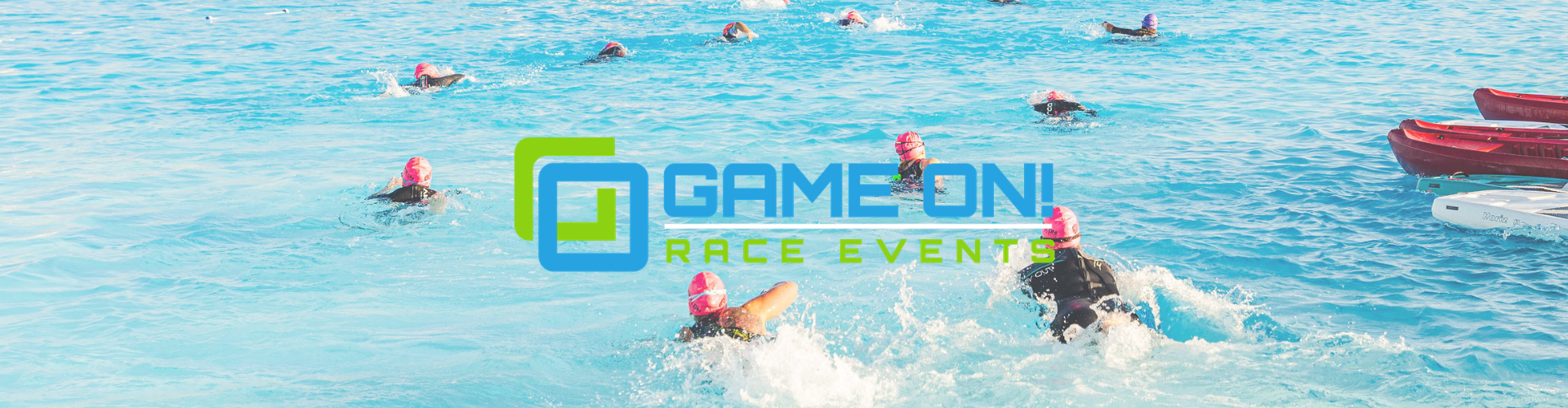 a group of people swimming in water