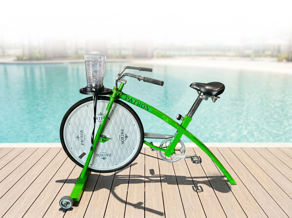 a green bicycle next to a pool