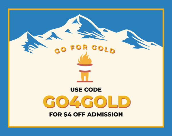 a sign with a mountain in the background