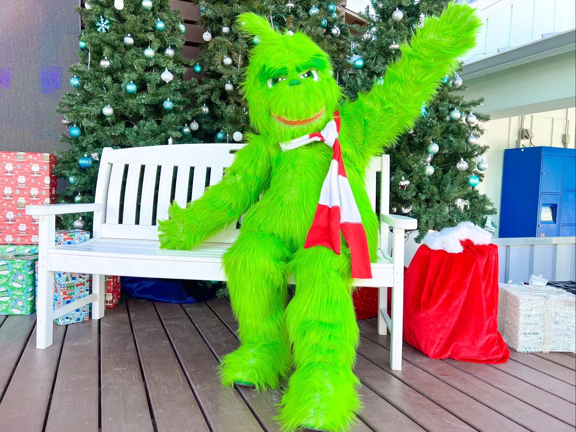 a person in a garment sitting on a bench