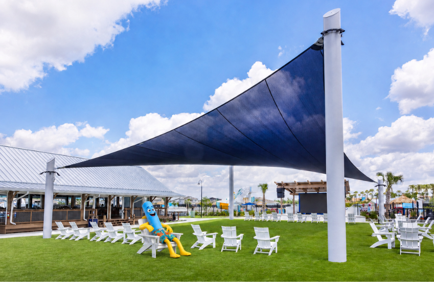 a large blue object on a white object in a chair in a lawn