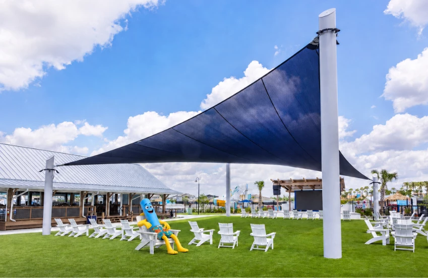 a large blue object on a white object in a chair in a lawn