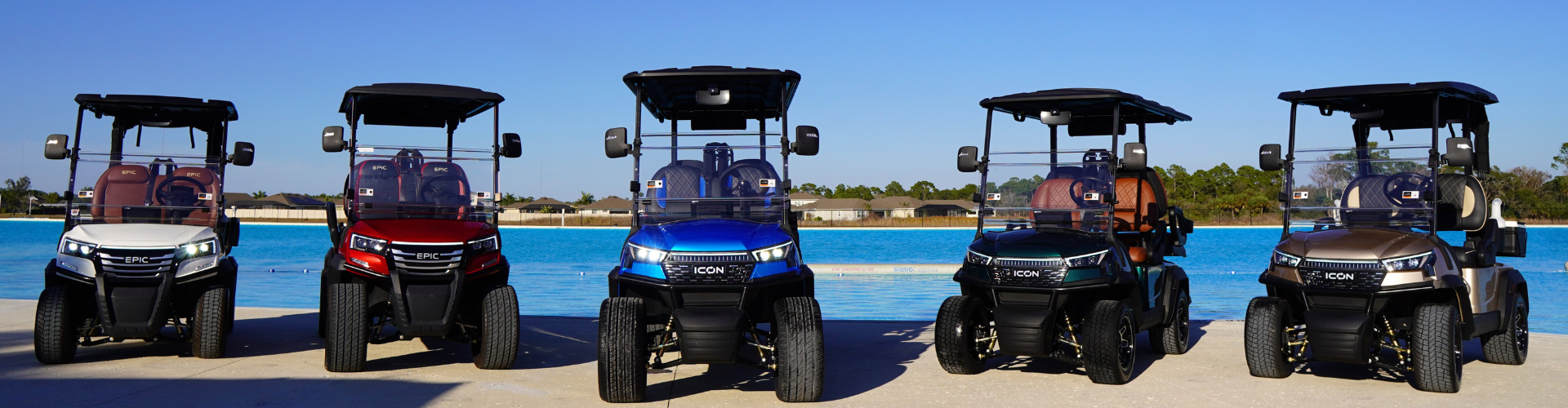 a two golf carts parked next to a pool