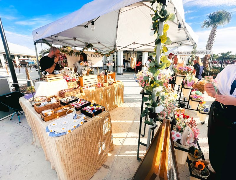 a group of people at a market