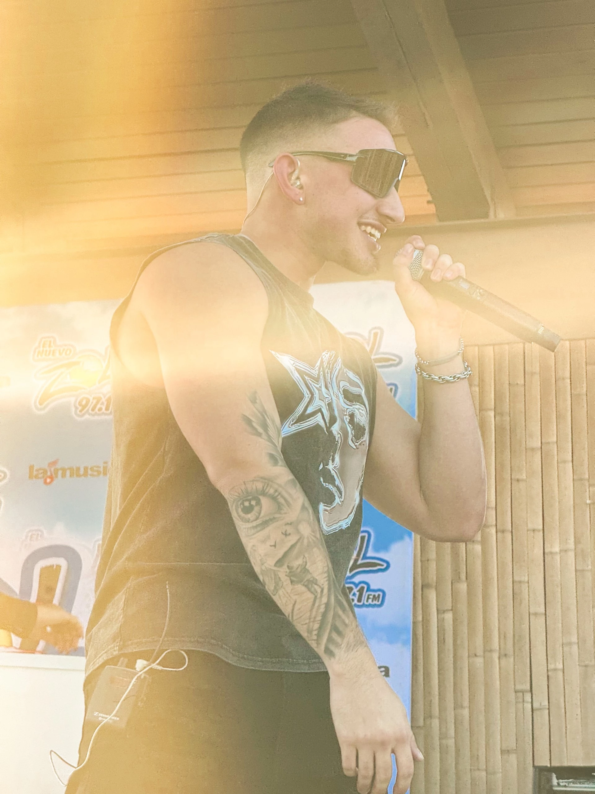 a man singing into a microphone