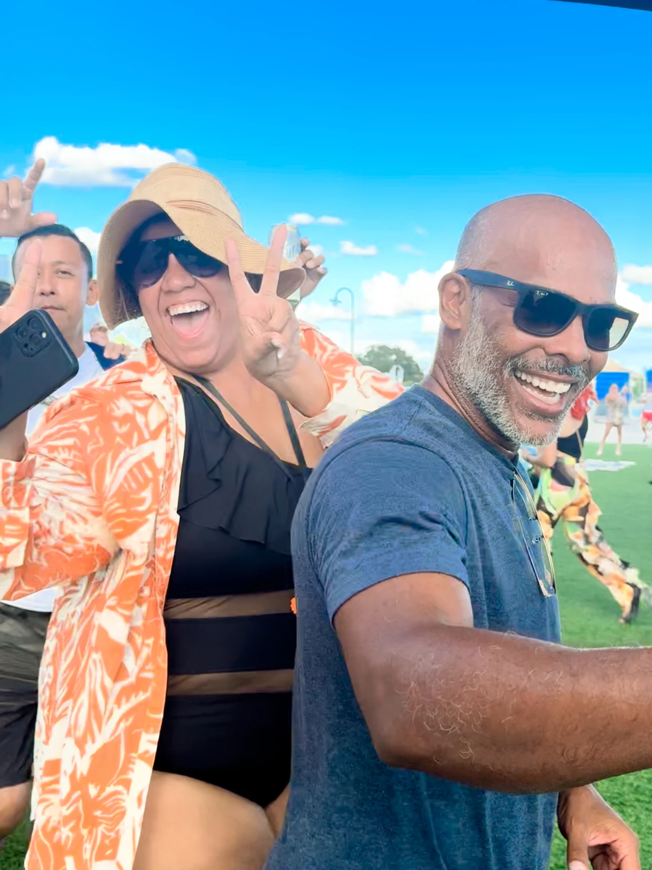 a group of people taking a selfie