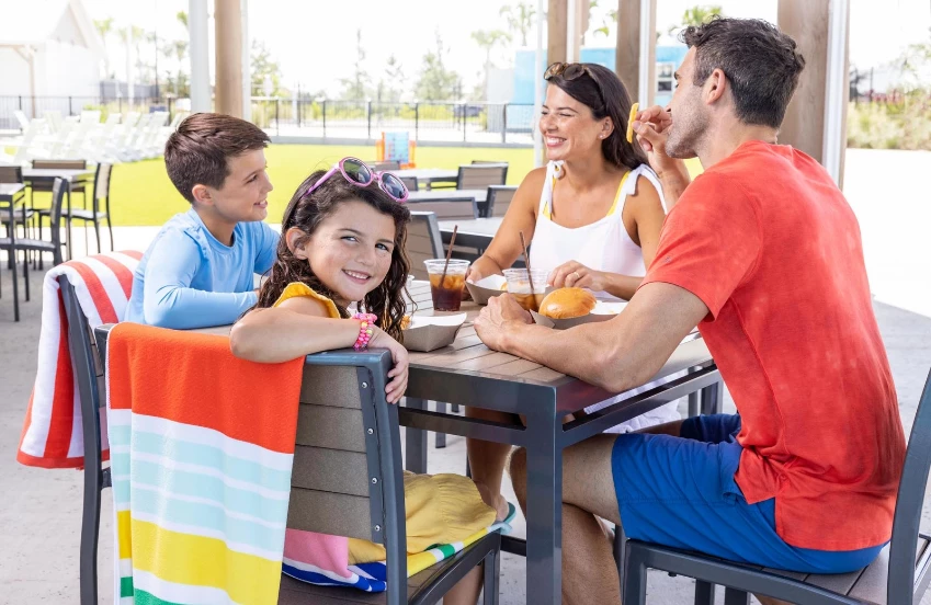a group of people sitting at a table