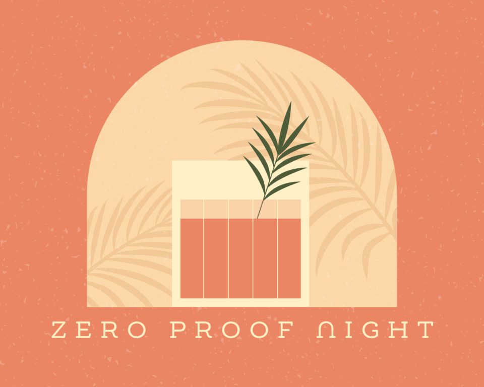 a glass of liquid with a leaf in it