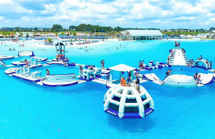 a group of people on a water park