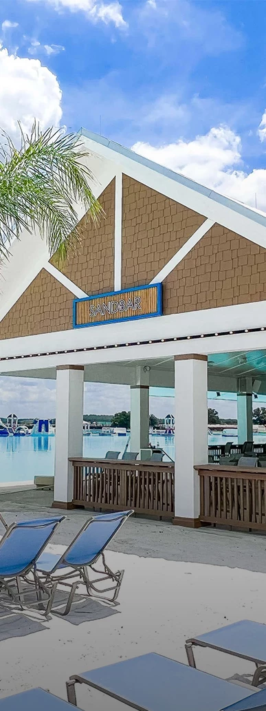 a building with a pool and a sign