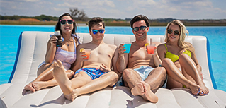 a group of people sitting on a raft