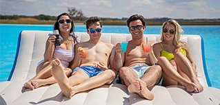 a group of people sitting on a raft