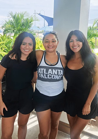 a group of women posing for a picture