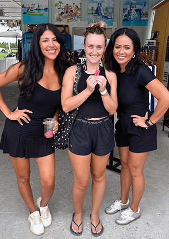 a group of women posing for a picture