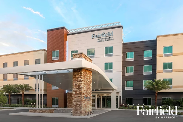 a building with a stone pillar