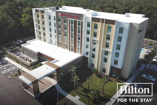 a building with trees in the background