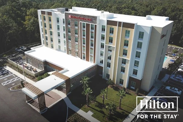 a building with trees in the background