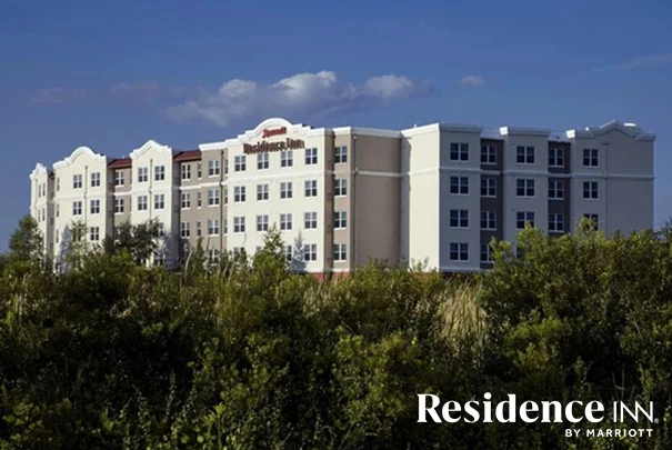 a building with trees in the background