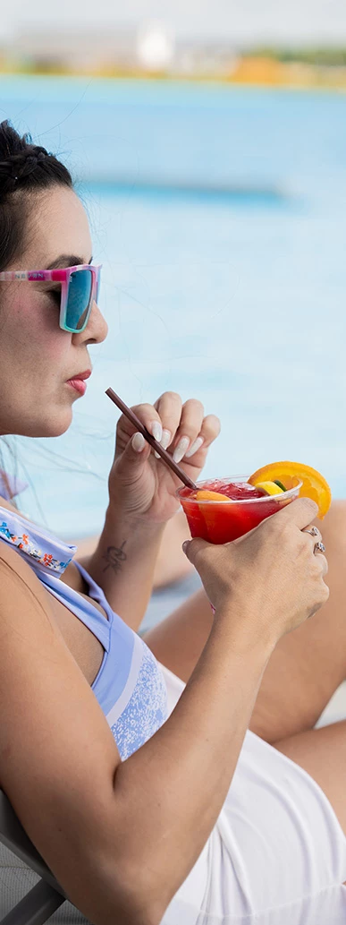 a woman drinking a drink