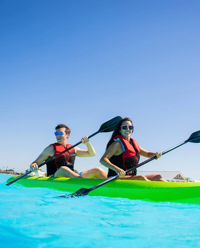 a man and woman in a kayak