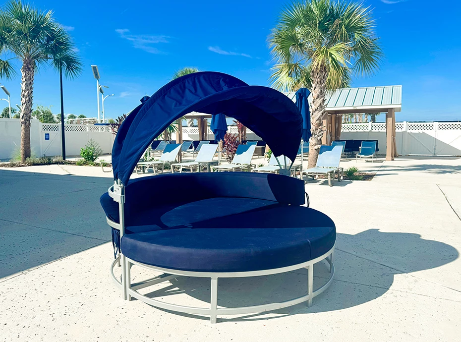 a round blue chair with a canopy