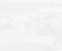 a building with a car in the background