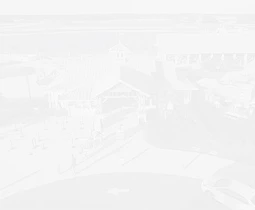 a building with a car in the background