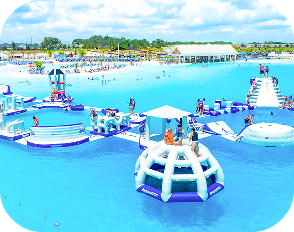 a large pool with people and floating rafts